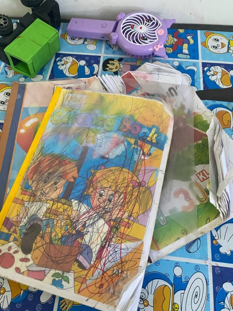 Second grade school workbook covered in angry scribbles showing writing refusal and frustration.